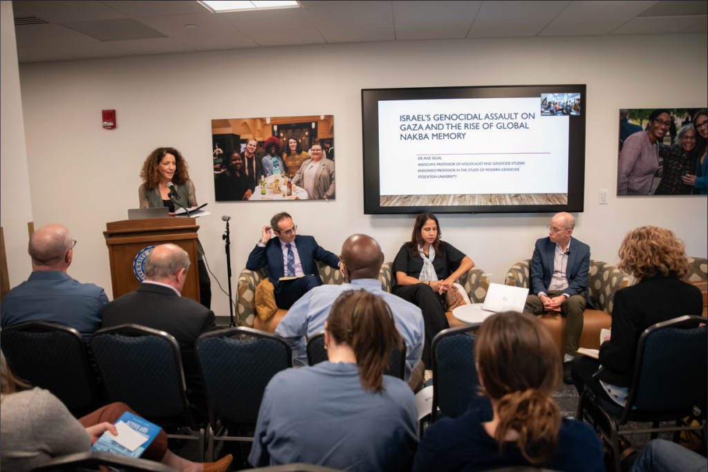 Photo of Professor Atalia Omer introducing Professor Raz Segal